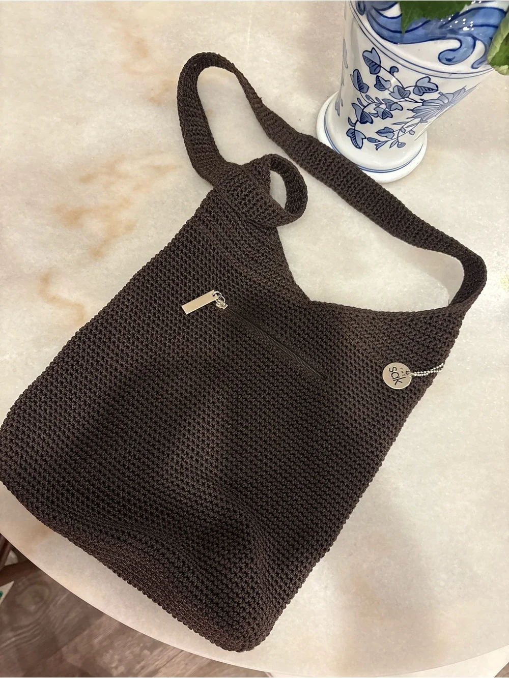 The Sak Dark Brown Crochet Shoulder Bag with Zip Pocket